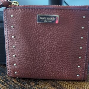 kate spade Pebbled Leather Zip Wallet in Burgundy with Gold Hardware
